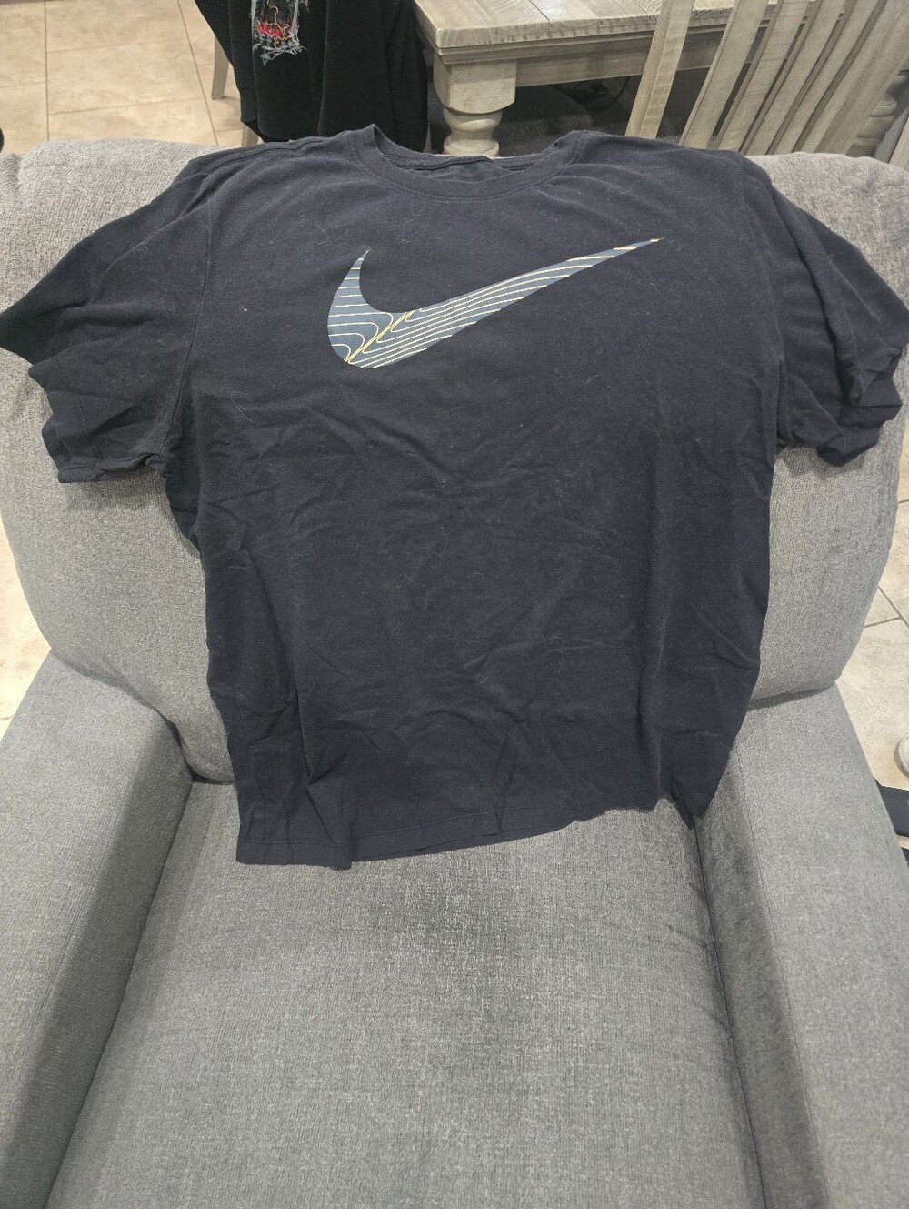Nike Black T‑Shirt with Blue/Yellow Swoosh